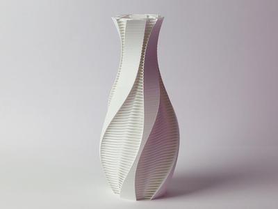 Twisted vase with strands