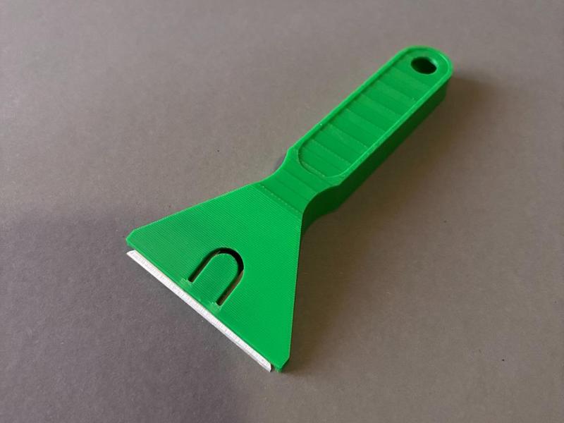 Scraper with Utility Blade