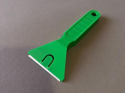 Scraper with Utility Blade