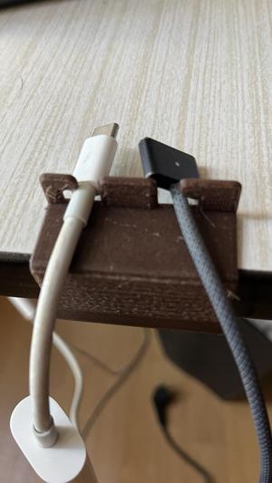 Table cable handler