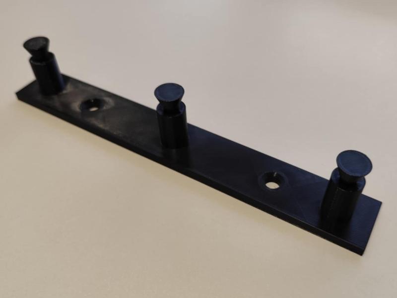 Simple wall-mounted clothes hook
