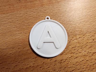 'A' Alphabet Round Keychain
