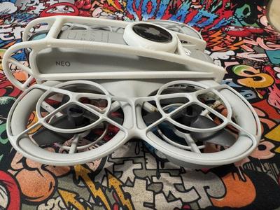 DJI NEO GUARD WITH AIRTAG 