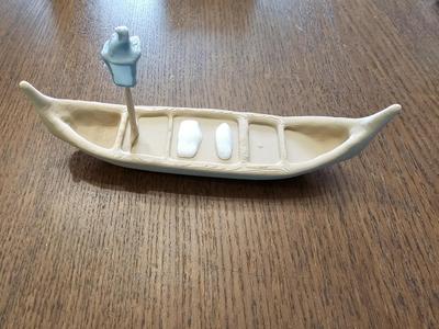 Wooden Canoe with Lantern n Pillows.3mf