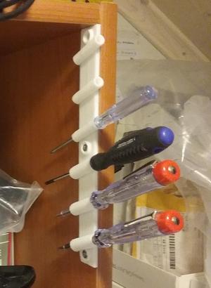 Screwdriver rack for small tools.