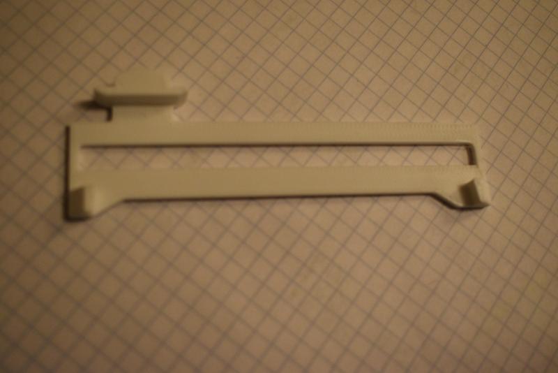 a modified trigger for Patpatruoille's OTF knife fidget