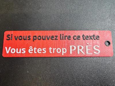 Porte clé flamme "Si vous pouvez lire ce texte"   