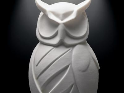 Geometric Guardian – A Bold Owl Sculpture