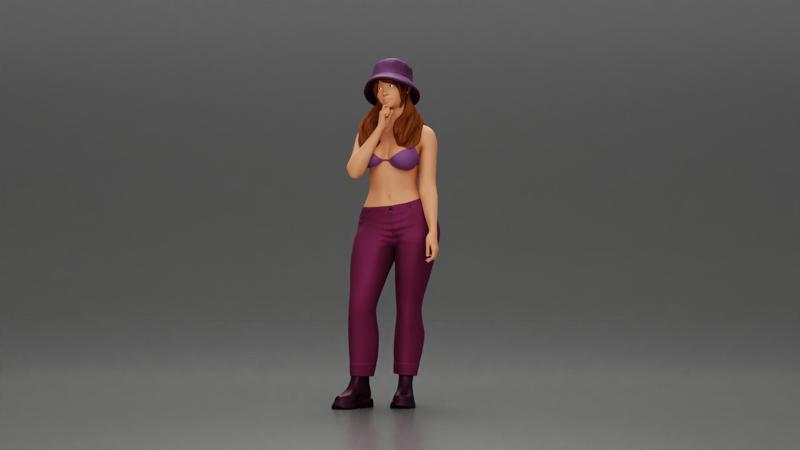 beautiful girl in pants and a hat thinking