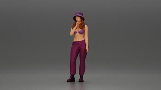 beautiful girl in pants and a hat thinking
