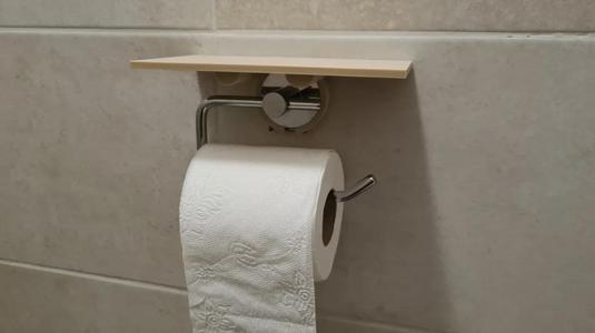 Attached bathroom shelf   