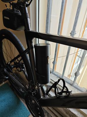 Bicycle buttle holder container