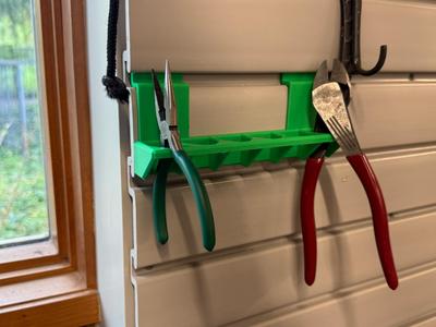 Slatwall plier holder