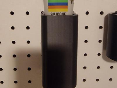 Peg board lubricant holder