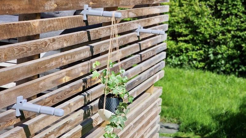 Railing-mounted plant hanger
