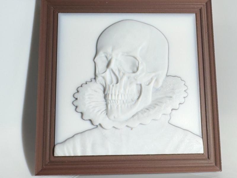 Skull sculpture in a frame