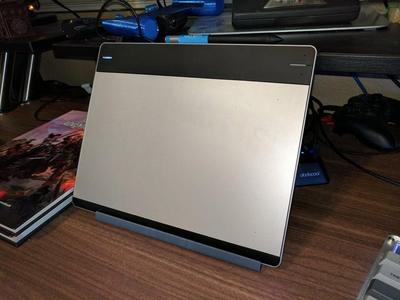 Tablet stand and easel for clampables desk clamp