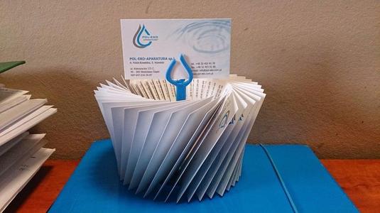 Circular business card holder