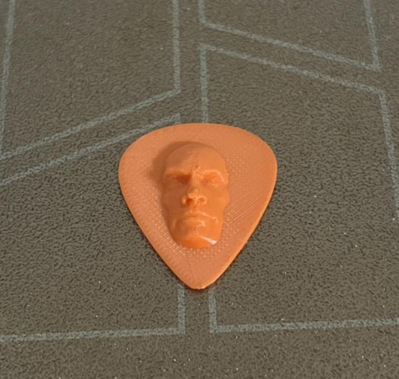 Rock guitar pick