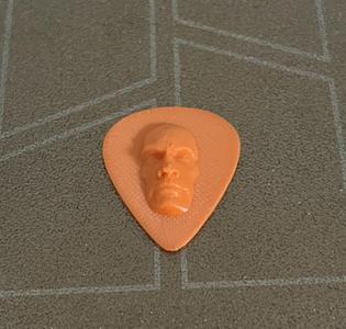 Rock guitar pick