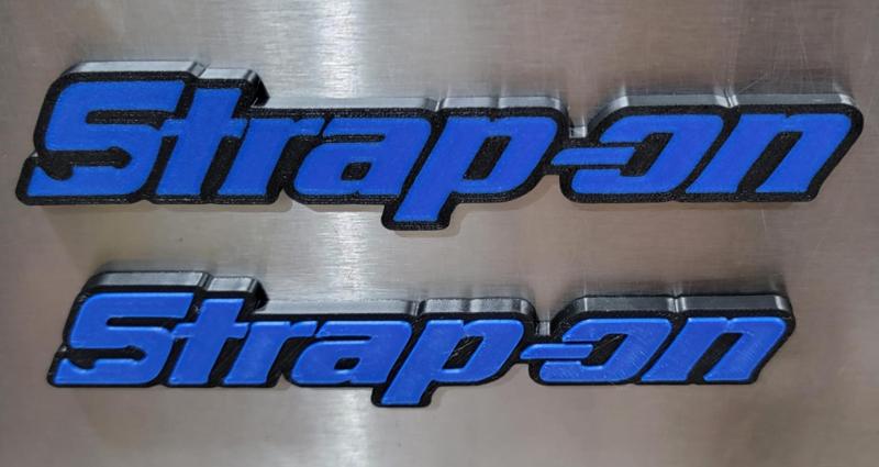 Strap-on magnetic badge/logo