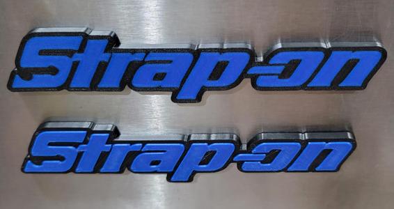 Strap-on magnetic badge/logo