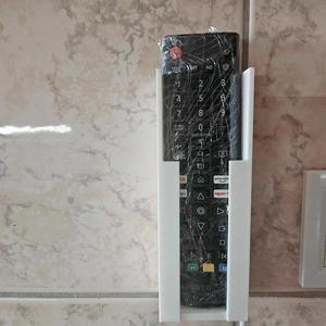 Tv remote wallmount