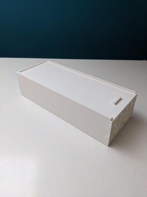 Box with sliding lid