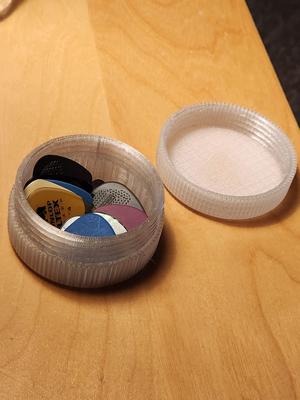 Guitar pick box with wheezer lick