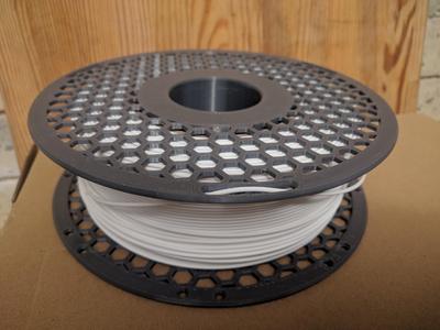 Parametric reusable filament master spool (adjusted to fit eSun Refilament)