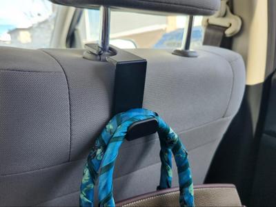 Car seat headrest hook