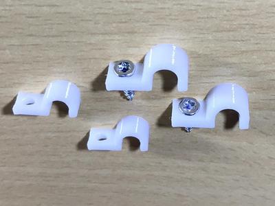 Cable clamp, cable clip, cable holder with hole
