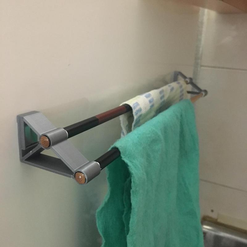 Kitchen towel drying rack with magnet