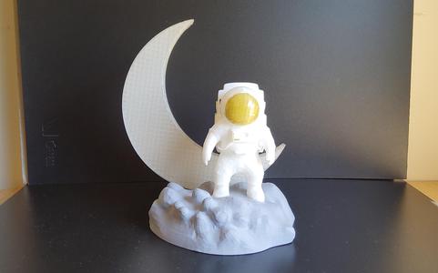 Space Man on an Asteroid with Moon