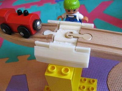 Duplo Brick to Brio Track adapter with snap-lock