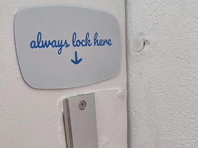 retro sign "always lock here"