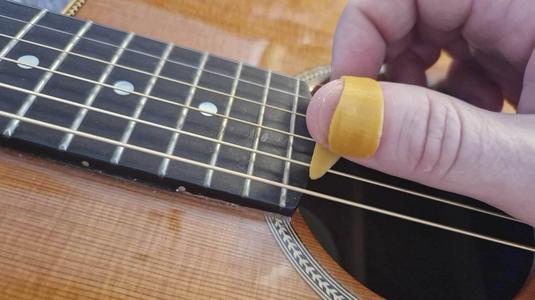 Ergonomic thumb pick for guitar, banjo, Dobro/resonator and steel guitar (easy to print)