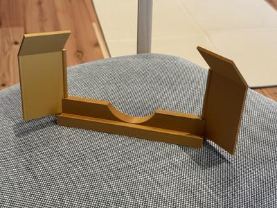 Mobile phone stand with sound amplifier