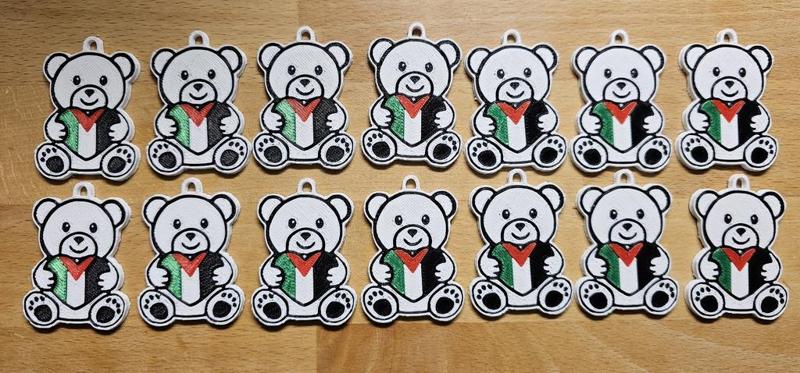 Teddy bear holding Palestine heart