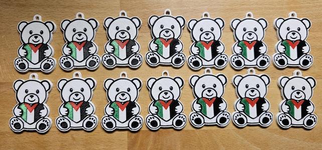 Teddy bear holding Palestine heart