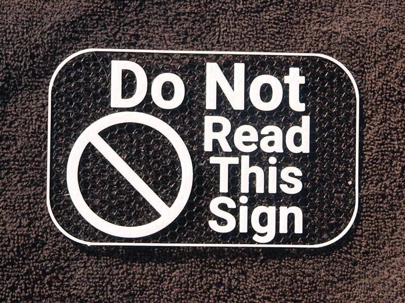 Do Not Read This sign