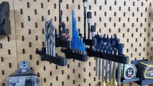 SKADIS Movable holders