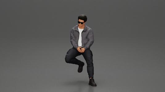 man sitting on a car, wearing a jacket and sunglasses, deep in thought