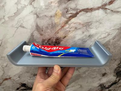 Shelf for toothpate tube