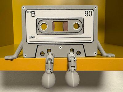 Vintage cassette with articulated legs
