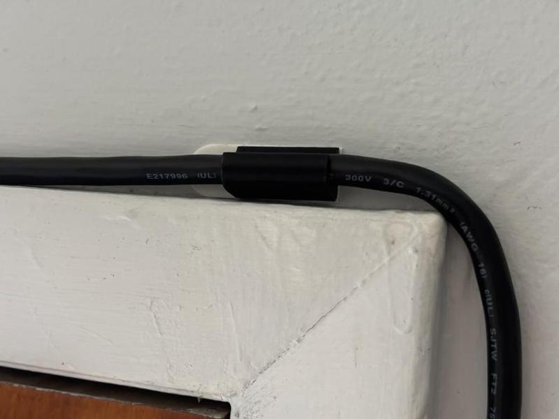 Discreet Extension Cord Holder