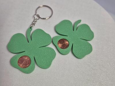 Four-leaf clover with a 1-cent coin