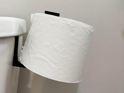 Toilet paper over the tank holder