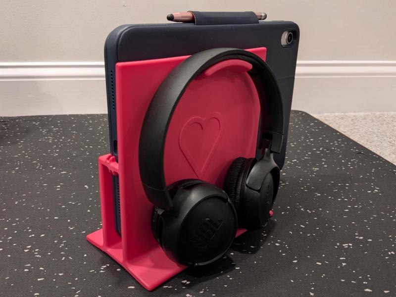 Tablet and headphone stand with cable holders