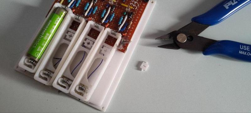 AA / AAA Battery holder - Adjustable polarity